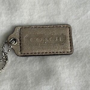 COACH 2.25" Hang Tag Fob Bag Charm Champagne Gold Leather, Silver Ball Chain